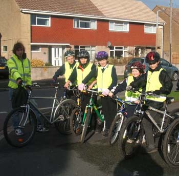 Group of children taking part in cycling proficiency Group of children taking part in cycling proficiency