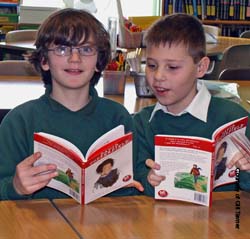 Two school boys reading Two school boys reading