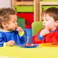 Nursery boys eating