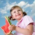Girl with slice of watermelon