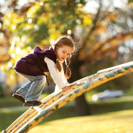 Girl on a climbing frame Girl on a climbing frame