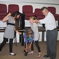 Children and teacher doing a drama activity