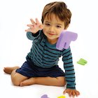 Boy throwing foam letters Boy throwing foam letters