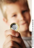 Boy holding money Boy holding money