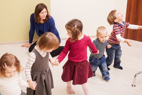 children playing a game at nursery  children playing a game at nursery