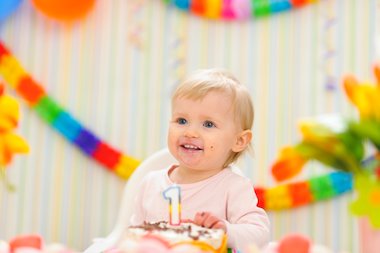 child with birthday cake child with birthday cake