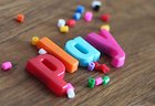 Toy letters spelling 'play'