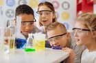 Children completing a science experiment